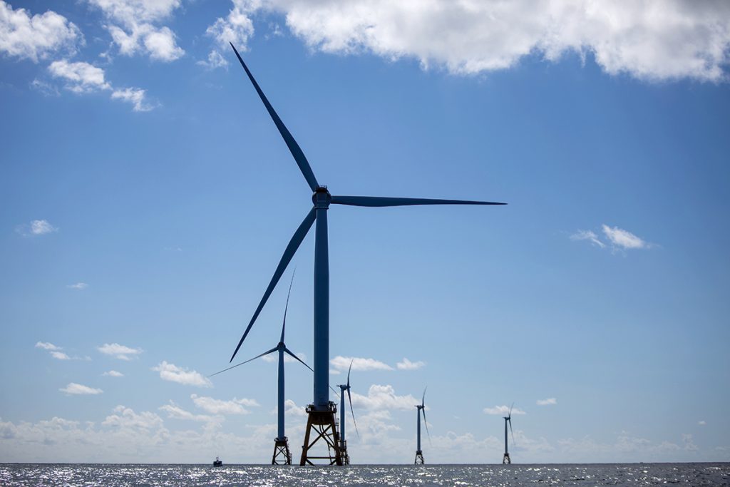 PLAYING CATCHUP: Although the Block Island Wind Farm, pictured, was the nation’s first offshore wind farm, the Ocean State appears to be playing catchup to neighboring Massachusetts, as the Port of New Bedford has completed a terminal expansion and improvement project and has agreements with major industry players Vineyard Wind and Orsted US Offshore Wind.   / BLOOMBERG NEWS FILE PHOTO/ERIC THAYER