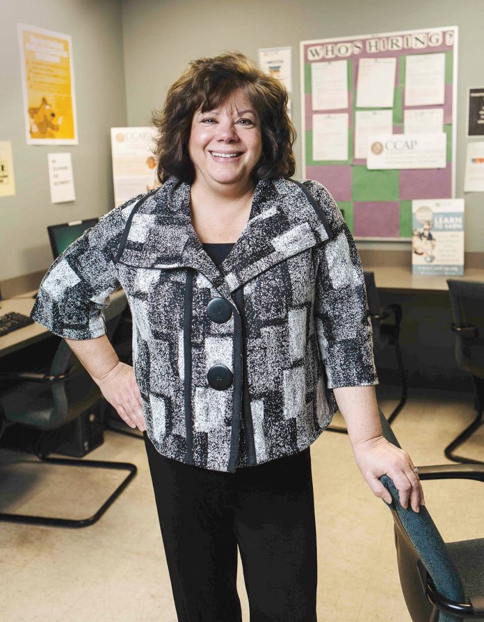 Joanne McGunagle is celebrating her 40th year working at CCAP, at which she started as a crisis intervention coordinator, eventually becoming executive director in 1985 and president and CEO in 2015. Under her leadership, CCAP has grown its budget and services dramatically. / PBN PHOTO/RUPERT WHITELEY