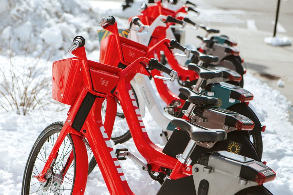 NEW PLAYER: JUMP Bikes are among the transportation disruptors in Rhode Island. Owned by ride-hailing service Uber, they have become common sights throughout Providence. But Scott Avedisian, head of the R.I. Public Transit Authority, sees the new service as a potential complement, rather than threat, to public transit.  / PBN PHOTO/RUPERT WHITELEY