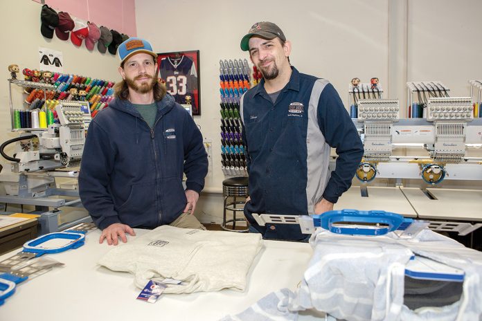 FRESH FRIENDSHIP: Fresh Mode Screen Printing co-owners Jake Fahrenholz, left, and Ethan Colby work on hoodies for a client. The pair became friends at the age of 15, attended college together and opened Fresh Mode in 2006.
/ PBN PHOTO/KATE WHITNEY LUCEY FRESH FRIENDSHIP: Fresh Mode Screen Printing co-owners Jake Fahrenholz, left, and Ethan Colby work on hoodies for a client. The pair became friends at the age of 15, attended college together and opened Fresh Mode in 2006.
/ PBN PHOTO/KATE WHITNEY LUCEY