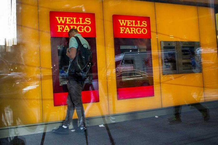 WELLS FARGO said it donated nearly $100,000 to Rhode Island nonprofits last year. / BLOOMBERG NEWS FILE PHOTO/ERIC THAYER