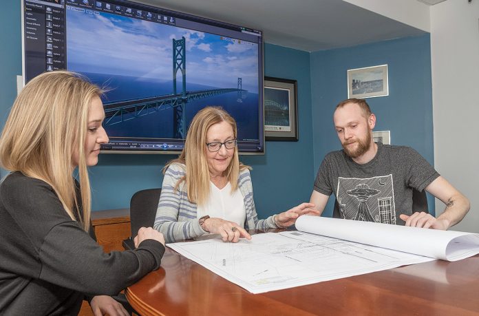 CONSISTENT GROWTH: Steere Engineering is a civil and structural engineering firm started nine years ago by founder ­Patricia Steere. It’s grown to employ 30, with $4 million in annual revenue. From left, Alison Steere, project manager; Patricia Steere, president; and Thomas Steere, 3D CAD specialist.  / PBN PHOTO/MICHAEL SALERNO