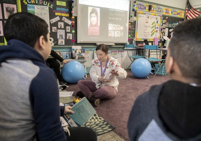 BETTER COMMUNICATION: Karey Bouvier, a fifth grade teacher at Carl Lauro Elementary School in Providence, said she became certified as an English as a second language teacher to better communicate with her students.  / PBN PHOTO/MICHAEL SALERNO