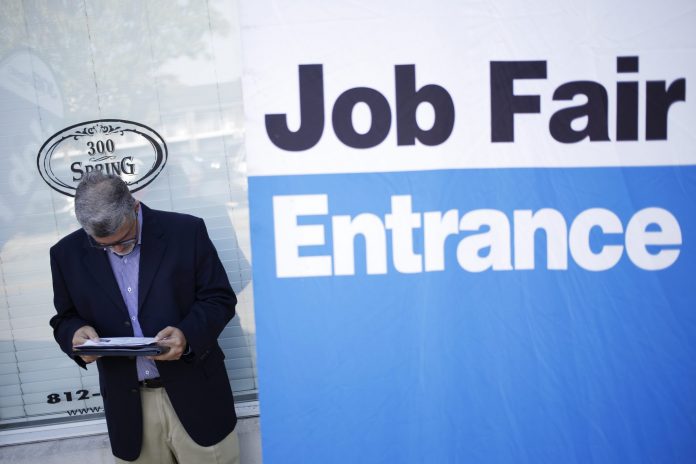 THE UNEMPLOYMENT RATE in the Providence-Warwick-Fall River metro area declined 0.8 percentage points year over year to 4.3 percent in February. / BLOOMBERG NEWS FILE PHOTO/LUKE SHARRETT