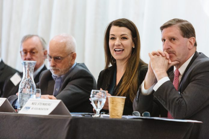 PANELISTS SPEAK at the 2019 PBN Spring Health Care Summit. Above, from left to right, Dr. John Murphy, Jim Purcell, Shannon Shallcross and Neil D. Steinberg. / PBN PHOTO/RUPERT WHITELEY