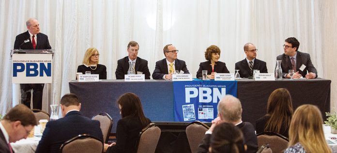 PROPOSED CHANGES: Panelists at the 2019 PBN Spring Health Care Summit discuss efforts of President Donald Trump’s administration to undermine or replace the Affordable Care Act, as well as Trump’s proposed changes in regulations for accountable care organizations and the cost of prescription drugs. From left: Dr. Marylou Buyse, chief medical officer of Neighborhood Health Plan of R.I.; Dr. James E. Fanale, CEO of Care New England; Chris Ferraro, chief financial officer at Coastal Medical; Marie L. Ganim, R.I. health insurance commissioner; Stephen Kogut, professor of pharmacy practice at URI; and Zachary W. Sherman, director of HealthSource RI.  / PBN PHOTO/RUPERT WHITELEY