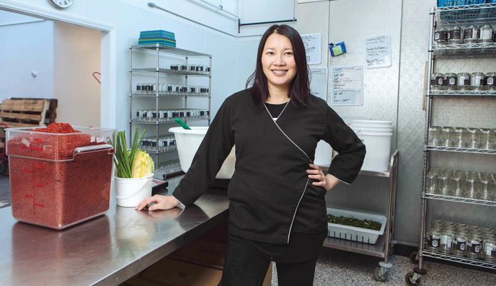 ON A MISSION: Minnie Luong, head of kimchi producer Chi Kitchen in Pawtucket, said it’s her mission to educate people about the unique Korean dish made from salted and seasoned fermented vegetables.  / PBN FILE PHOTO/RUPERT WHITELEY