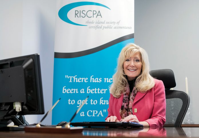 STRONG LEADER: Melissa D. Travis is the new president of the Rhode Island Society of Certified Public Accountants and the first woman to hold the position since the organization’s formation in 1905.     / PBN PHOTO/ MICHAEL SALERNO