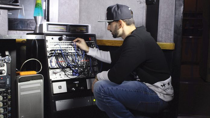MIX MASTER: Recording and mixing engineer Dacota Fresilli formed DG Engineering in Providence in January, a one-man music-mixing company, with hopes of eventually opening a full-service mixing studio. His goal this year is to mix 1,000 songs.
/ COURTESY DACOTA FRESILLI MIX MASTER: Recording and mixing engineer Dacota Fresilli formed DG Engineering in Providence in January, a one-man music-mixing company, with hopes of eventually opening a full-service mixing studio. His goal this year is to mix 1,000 songs.
/ COURTESY DACOTA FRESILLI