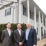 ROOM TO GROW: The Egis Group recently relocated from Providence to its own building in Warwick, and is expanding. From left, Corey Finkelman, director of marketing; Alex Finkelman, vice president; and Roy Finkelman, president.  / PBN PHOTO/MICHAEL SALERNO