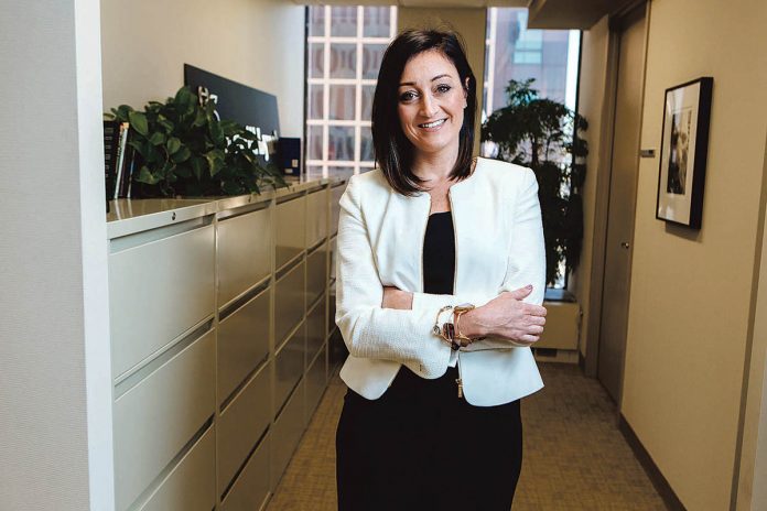 SPECIAL NICHE: Ashley Abbate Macksoud, a Merrill Lynch vice president and wealth management adviser, caters to women who suddenly are going it alone because of a divorce or the death of a spouse.  / PBN PHOTO/RUPERT WHITELEY