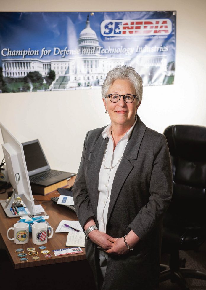 ON THE OFFENSIVE: Molly Donohue Magee has taken the Southeastern New England Defense Industry Alliance from an all-volunteer group to a $1 million entity with five employees and more than 125 member companies.  / PBN PHOTO/DAVE HANSEN