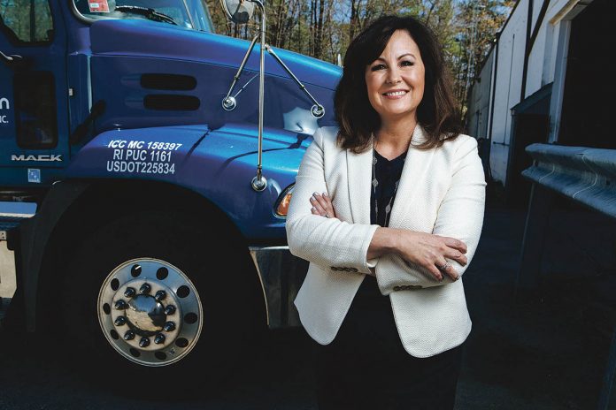 KEEP ON TRUCKING: Elizabeth Robson started on the lowest rung of her family’s business, JF Moran, decades ago and worked her way up – including earning a law degree – until she was named president in 2015. She also teaches at Johnson & Wales University.   / PBN PHOTO/RUPERT WHITELEY