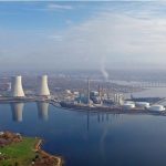 THE SITE that was formerly the Brayton Point coal power plant is expected to be the host of a 1,200 megawatt high-voltage, direct-current converter for offshore wind projects. Above, the Brayton Point site before the plant was decommissioned in 2017. The plant's cooling towers have since been demolished. / COURTESY DYNEGY INC.