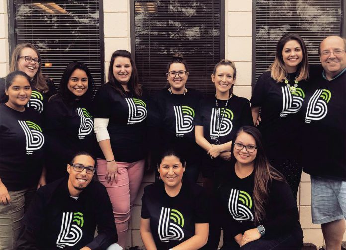 FASHIONABLE: The staff at Big Brothers Big Sisters of R.I. model T-shirts featuring the agency’s new logo, highlighting a national branding effort.   / COURTESY BIG BROTHERS BIG SISTERS OF RHODE ISLAND 