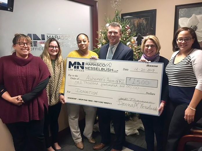 CHECK IT OUT: Staff members at Marasco & Nesselbush donate $1,500 to the Alzheimer’s Association, Rhode Island chapter.
/ COURTESY MARASCO & NESSELBUSH CHECK IT OUT: Staff members at Marasco & Nesselbush donate $1,500 to the Alzheimer’s Association, Rhode Island chapter.
/ COURTESY MARASCO & NESSELBUSH