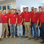 MATCH DAY: Members of the Pariseault Builders staff at the company headquarters in Warwick.   / COURTESY PARISEAULT BUILDERS