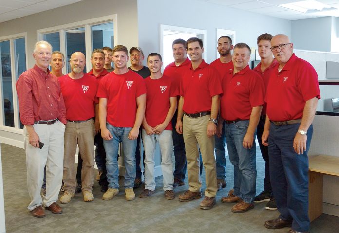 MATCH DAY: Members of the Pariseault Builders staff at the company headquarters in Warwick.   / COURTESY PARISEAULT BUILDERS