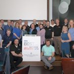 HAPPY OCCASION: Employees at Custom Computer Specialists mark the company being named one of the 2019 PBN Best Places To Work.  / COURTESY CUSTOM COMPUTER SPECIALISTS 