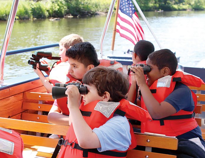 SEEING SIGHTS: Children enjoy the RiverClassroom on the Blackstone River, a program supported by the Narragansett Bay Commission.  / COURTESY NARRAGANSETT BAY COMMISSION