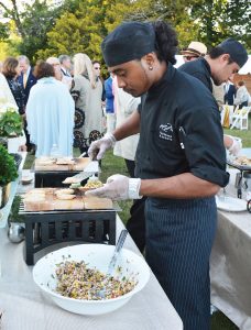 FLOWER SHOW: A chef from Russell Morin Catering & Events prepares hors d’oeuvres for the Preview Party at the Newport Flower Show, which will be held at Rosecliff from June 21-23.  / COURTESY PRESERVATION SOCIETY OF NEWPORT COUNTY