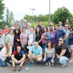 IN GOOD COMPANY: BSMG employees gather for an annual outing at Mulligan’s Island in Cranston in 2018.  / COURTESY BROKERS’ SERVICE MARKETING GROUP