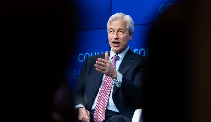 JPMORGAN Chase & Co. CEO Jamie Dimon warned the company's biggest rival, Bank of America, that Chase is aiming to compete for its retail banking business with expansion into 20 cities. / BLOOMBERG NEWS FILE PHOTO/MARK KAUZLARICH