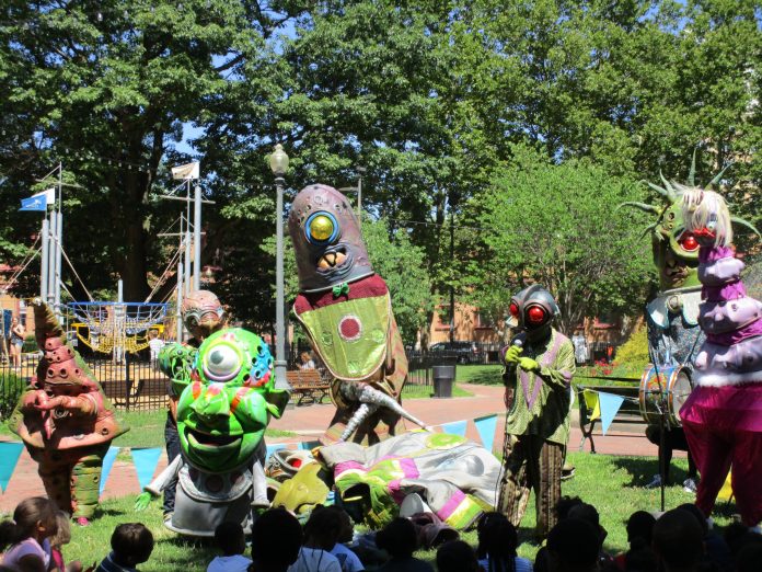 THE DOWNTOWN PROVIDENCE Parks Conservancy received $35,000 to help fund operations at Burnside Park from June through September. Above, Big Nazo performing at Storytime + Art in the Park. / COURTESY THE PROVIDENCE FOUNDATION/KRISTIN CRANE