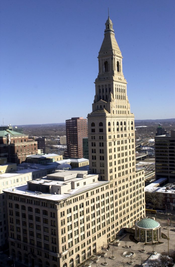 CONNECTICUT LAWMAKERS CLOSED a $3.7 billion gap in the state's $43 billion two-year budget while sparing residents an income-tax increase. The budget is getting mostly positive reviews from investors. Above, the Travelers Property and Casualty headquarters in Hartford, Conn. / BLOOMBERG FILE PHOTO/GEORGE RUHE CONNECTICUT LAWMAKERS CLOSED a $3.7 billion gap in the state's $43 billion two-year budget while sparing residents an income-tax increase. The budget is getting mostly positive reviews from investors. Above, the Travelers Property and Casualty headquarters in Hartford, Conn. / BLOOMBERG FILE PHOTO/GEORGE RUHE