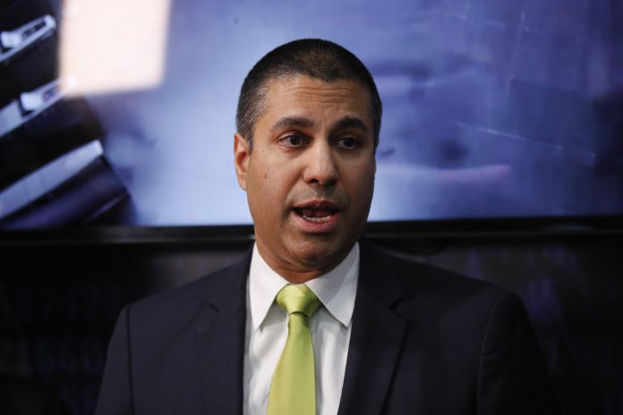 THE FCC authorized carriers to automatically identify and block unwanted robocalls by using analytics that home in on sources of large bursts of calls, or place calls of brief duration, or other means. The measure applies to both landline and wireless telephone systems. Above, FCC Chairman Ajit Pai. / BLOOMBERG NEWS FILE PHOTO/STEFAN WERMUTH