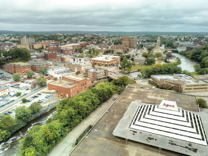SPURRING REDEVELOPMENT: Pictured above is the former Apex department store in Pawtucket. The city could benefit from a new law that aligns tax-increment financing authority in the city to newly created federal opportunity zones, which would allow the city to finance public infrastructure improvements to facilitate ­redevelopment.  / PBN FILE PHOTO/ARTISTIC IMAGES