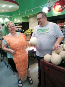 OPENING DAY: Suzette Snow, left, of Neighboring Food Co-Op Association of Shelburne Falls, Mass., speaks with Jesse Cardarelli, owner-manager of Urban Greens in Providence, on opening day at the new co-op.   / PBN PHOTO/BRUCE NEWBURY
