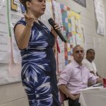 ANGÉLICA INFANTE-GREEN, the new state education commissioner, will request authority Tuesday from the Council on Elementary and Secondary Education to intervene in the Providence public schools. Behind her above, is Providence Mayor Jorge. O. Elorza./ PBN FILE PHOTO/MICHAEL SALERNO