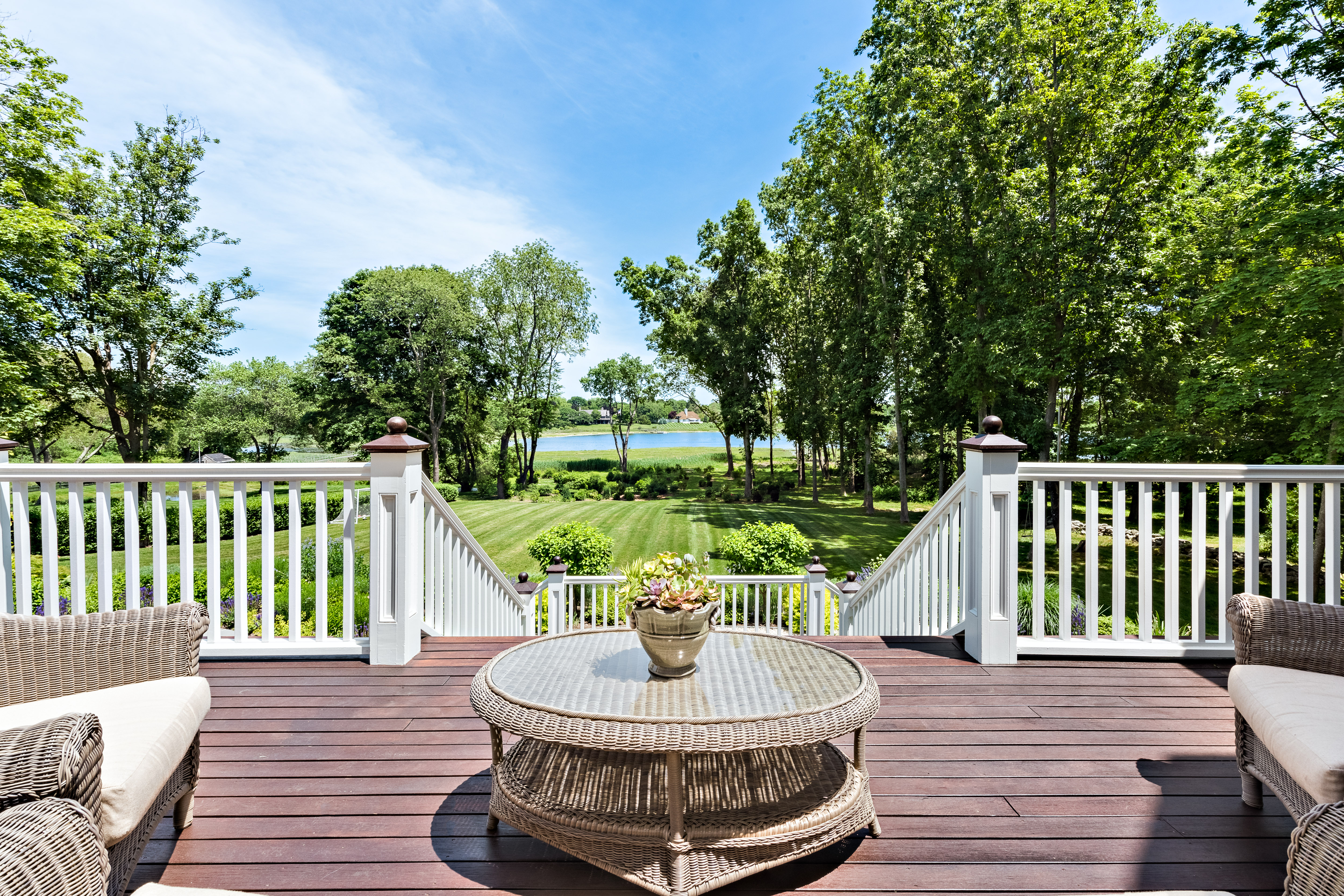THE PROPERTY features water views from a warp-around porch. / COURTESY MOTT & CHACE SOTHEBY'S INTERNATIONAL REALTY