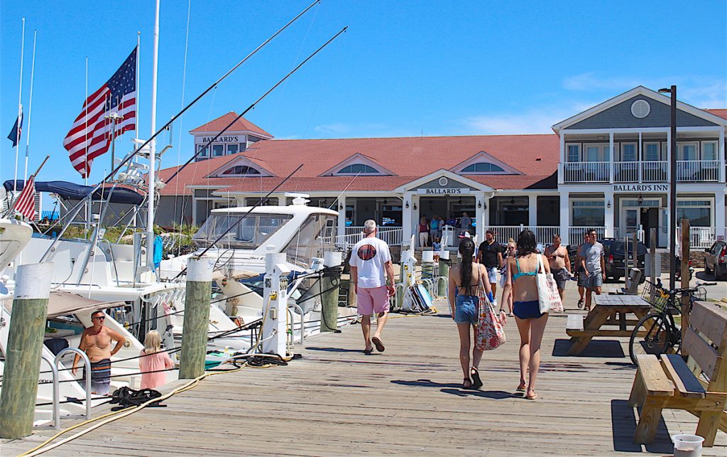 UNIFIED PLAN: Tourists walk in front of Ballard’s hotel and beach club, one of Block Island’s oldest and most popular businesses. Jessica Willi, executive director of the Block Island Tourism Council, said a unified plan for tourism requires communication and money.
/ PBN FILE PHOTO/K. CURTIS