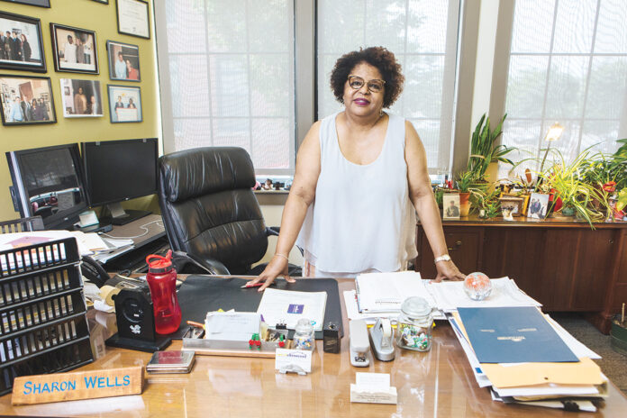 COMMUNITY LINCHPIN: As longtime executive director of West Elmwood Housing Development Corp., Sharon Conard-Wells has played a role in innovative projects, such as the Sankofa Initiative, that have revived blighted properties.   / PBN PHOTO/RUPERT WHITELEY