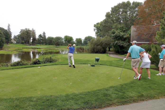 ANNUAL TOURNAMENT: Golfers tee off during a previous North Kingstown Chamber of Commerce Golf Tournament. This year’s tournament will be held at Quidnessett Country Club in North Kingstown on Aug. 5.  / COURTESY NORTH KINGSTOWN CHAMBER OF COMMERCE