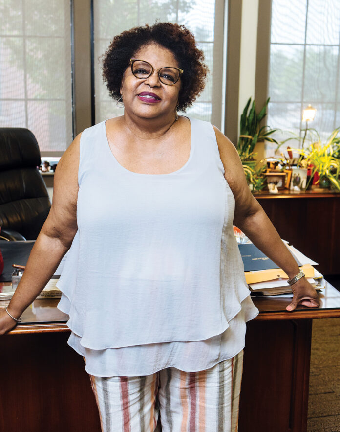 Dedicated to bringing safe, affordable housing to her neighborhood, Sharon Conard- Wells has raised more than $120 million for the West Elmwood Housing Development Corp., for which she has been executive director since 1991. / PBN PHOTO/RUPERT WHITELEY