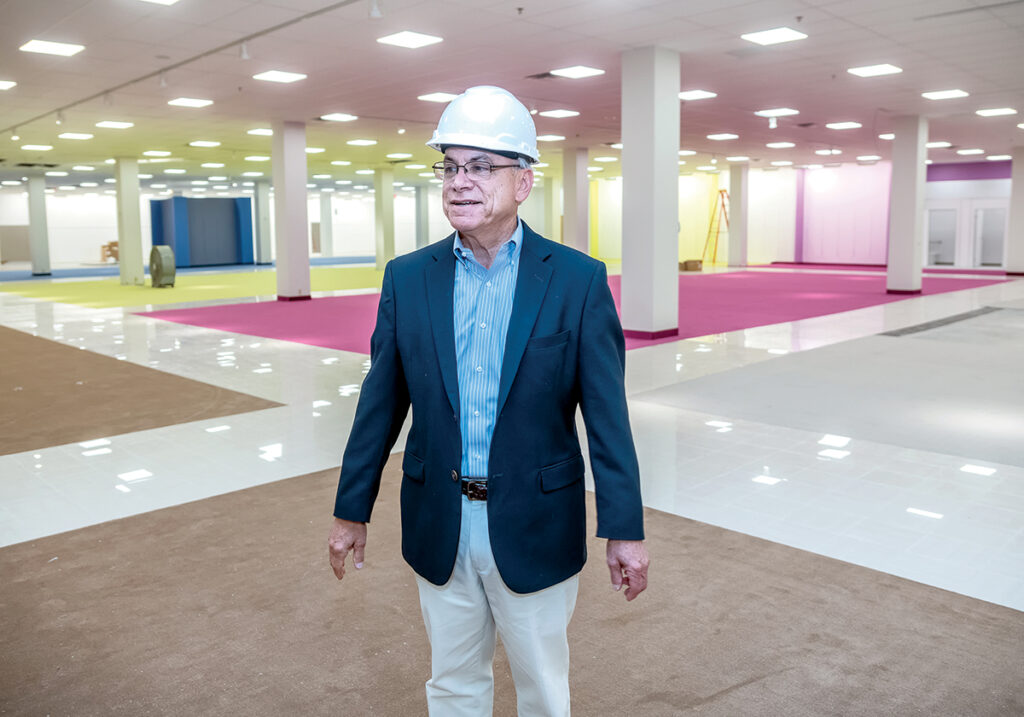 NEW SPACE: Jim Boscov, chairman and CEO of Boscov’s department store, stands in the space formerly occupied by Providence Place mall anchor tenant Nordstrom. Boscov’s will take over the space and is scheduled to open at the end of September.  / PBN PHOTO/MICHAEL SALERNO