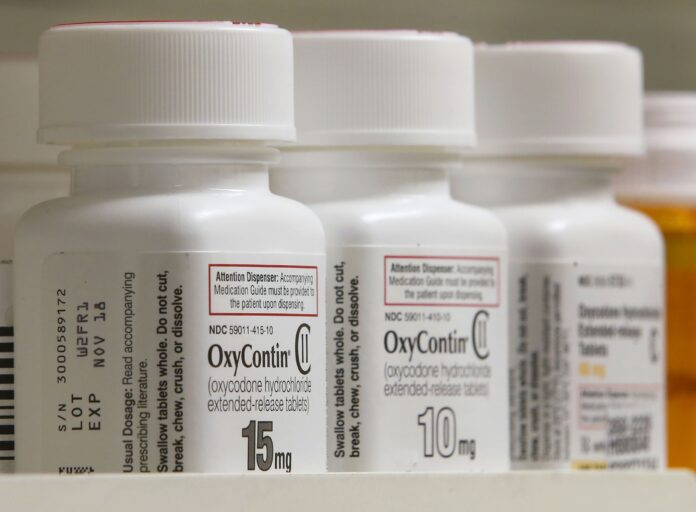 PURDUE PHARMA' and its owners, the Sackler family, are offering to settle more than 2,000 lawsuits against the company related to the opioid epidemic for $10 billion to $12 billion. / BLOOMBERG NEWS FILE PHOTO/GEORGE FEY PURDUE PHARMA' and its owners, the Sackler family, are offering to settle more than 2,000 lawsuits against the company related to the opioid epidemic for $10 billion to $12 billion. / BLOOMBERG NEWS FILE PHOTO/GEORGE FEY