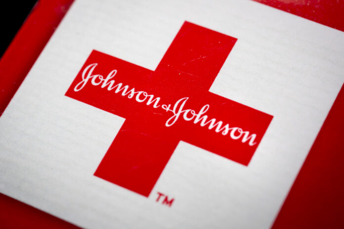 JOHNSON & JOHNSON shares rose as much as 5% after an Oklahoma judge ordered the company to pay $572 million to the state for the public-health crisis spawned by opioid painkillers. Oklahoma had sought as much as $17.5 billion. / BLOOMBERG NEWS FILE PHOTO