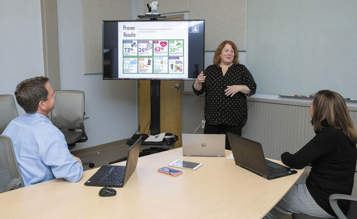 RUNNING THE NUMBERS: Pro-Change Behavior Systems Inc. co-CEO and co-President Kerry Evers, center, reviews the clinically validated results on behavior change with Dave Armitage, left, vice president of businesss management and development, and Deborah Van Marter, director of client relations.
PBN PHOTO/TRACY JENKINS RUNNING THE NUMBERS: Pro-Change Behavior Systems Inc. co-CEO and co-President Kerry Evers, center, reviews the clinically validated results on behavior change with Dave Armitage, left, vice president of businesss management and development, and Deborah Van Marter, director of client relations.
PBN PHOTO/TRACY JENKINS