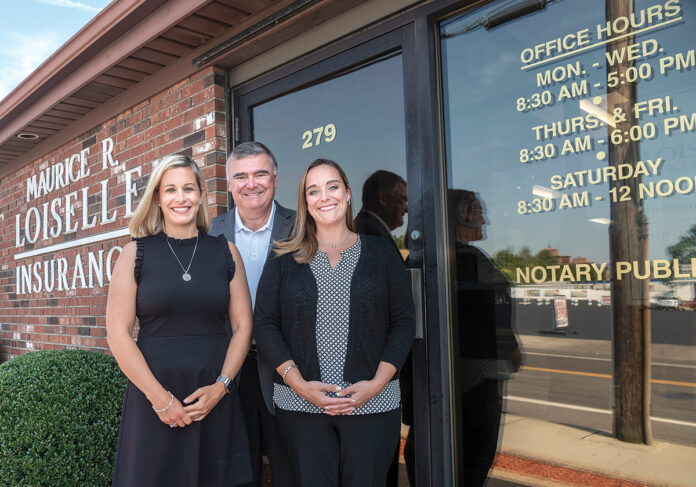 GENERATIONAL LEADERSHIP: Robert Loiselle, president of Loiselle Insurance Agency in Pawtucket, runs the business with his two daughters, who both serve as vice presidents, Melanie Loiselle-Mongeon, left, who also serves as office administrator, and Brenda Loiselle-Marcotte. All three are owners of the company.    / PBN PHOTO/MICHAEL SALERNO