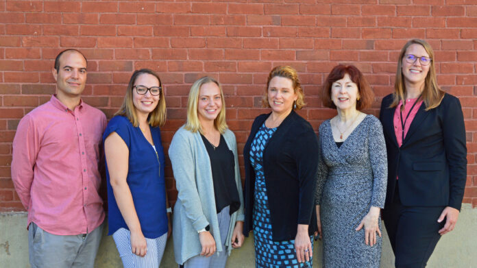 A RESEARCH scientist with the Providence VA Medical Center was awarded a $15 million DOD contract. Above, from left, are Matthew Borgia, Rachel Underwood, Josephine Airoldi, Dr. Linda J. Resnik, Eileen Small and Sarah Biester of the Providence VA Medical Center. Led by Resnik, the team will study and compare the effectiveness of different prostheses types. / COURTESY WINFIELD DANIELSON