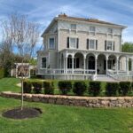 CHERYL HACKETT and John Grosvenor will be honored with the Rhody Awards Historic Homeowner Award for the restoration of the Restmere property in Middletown, pictured above. / COURTESY NEWPORT RESTORATION FOUNDATION