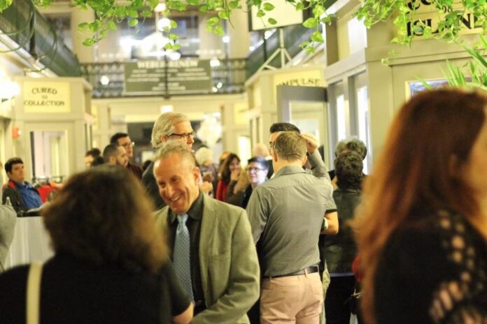 ATTENDEES MINGLE during a previous Project Weber/RENEW Celebrating CommUNITY event held at The Arcade in Providence. This year's event will take place Oct. 25 at Rooms & Works in Providence. / COURTESY PROJECT WEBER/RENEW ATTENDEES MINGLE during a previous Project Weber/RENEW Celebrating CommUNITY event held at The Arcade in Providence. This year's event will take place Oct. 25 at Rooms & Works in Providence. / COURTESY PROJECT WEBER/RENEW