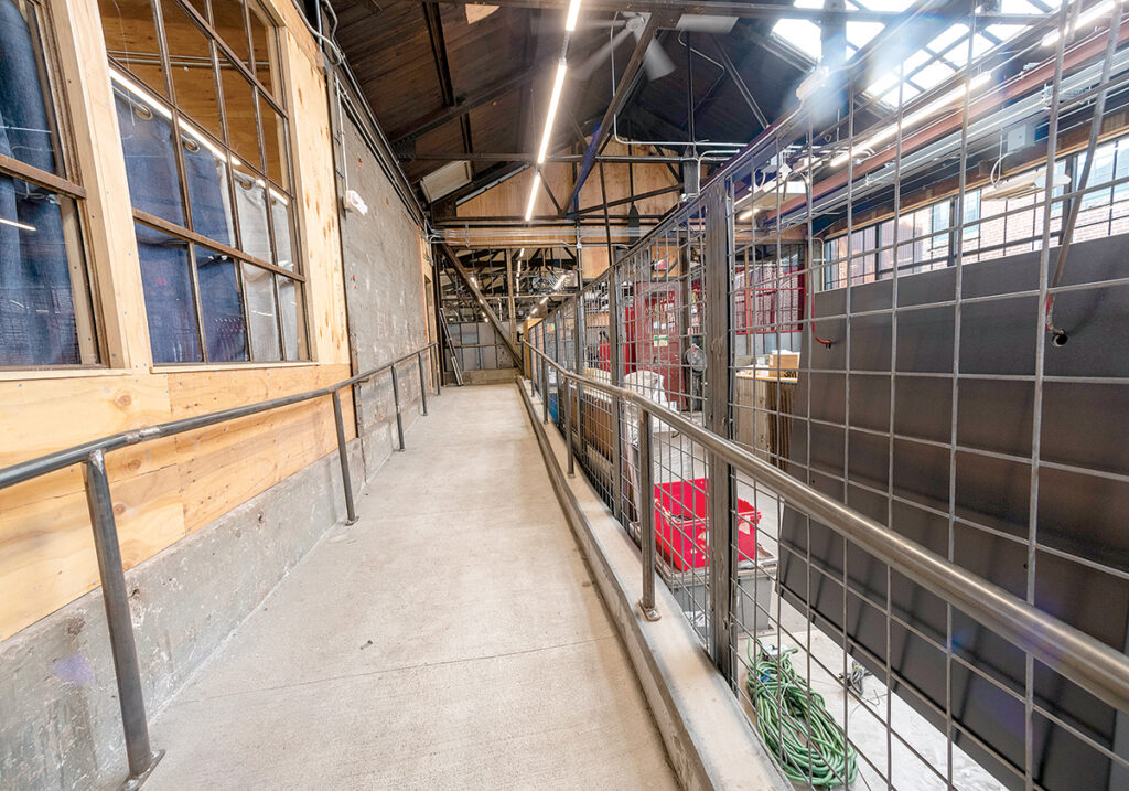 EASIER ACCESS: New handicapped ramps lead to the new handicapped-accessible bathroom in The Steel Yard’s interior and into the new lobby area from the exterior. /  PBN PHOTO/MICHAEL SALERNO