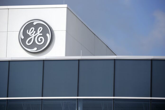GENERAL ELECTRIC CO. reported a loss of $9.4 billion in the third quarter, an improvement from the company's previous quarters. / BLOOMBERG NEWS FILE PHOTO/LUKE SHARRETT