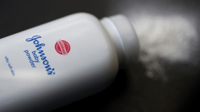 CVS is removing all 22-ounce-sized Baby Powder bottles from its stores and off its website after government regulators found tiny amounts of asbestos in one lot of the talc-based product. / BLOOMBERG NEWS FILE PHOTO/JUSTIN SULLIVAN CVS is removing all 22-ounce-sized Baby Powder bottles from its stores and off its website after government regulators found tiny amounts of asbestos in one lot of the talc-based product. / BLOOMBERG NEWS FILE PHOTO/JUSTIN SULLIVAN