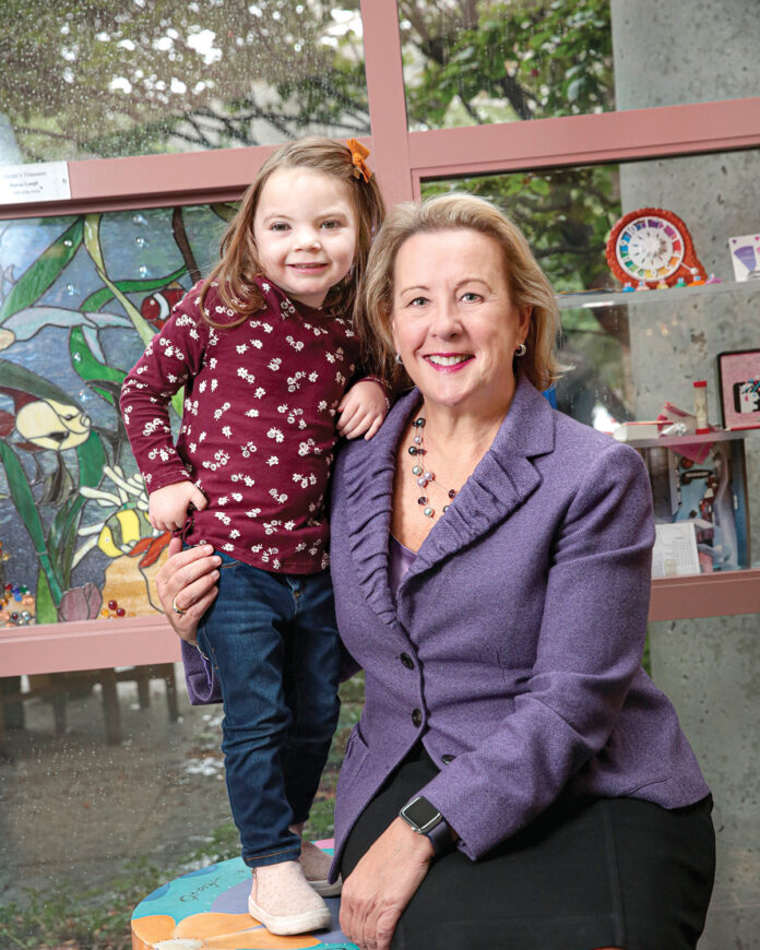 ALL SMILES: Dr. Margaret Van Bree, president of Rhode Island Hospital and Hasbro Children’s Hospital, with one of Hasbro’s patients, Gemma Grayce Reall. /  COURTESY LIFESPAN CORP.